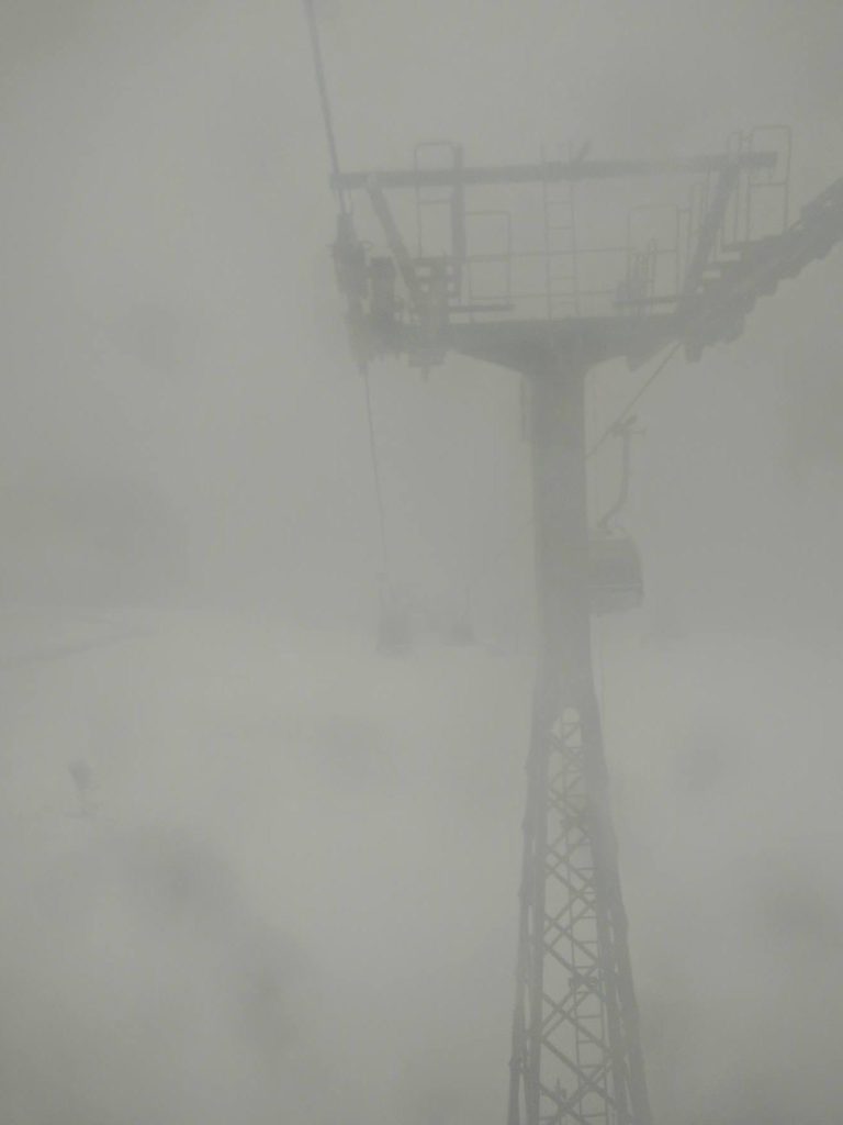 A view of snowy weather conditions with very little visibility