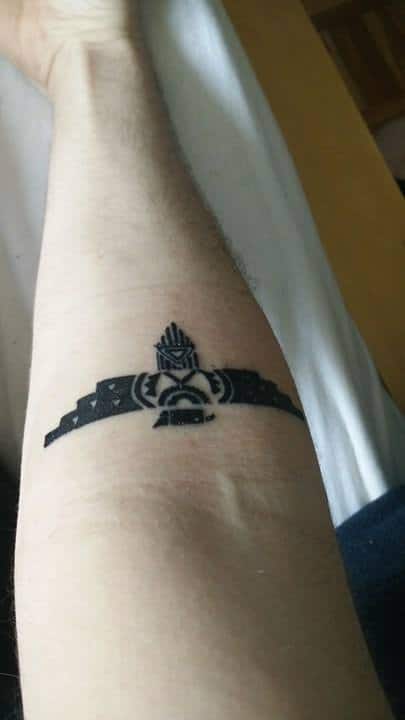 Thunderbird tattoo on lower arm