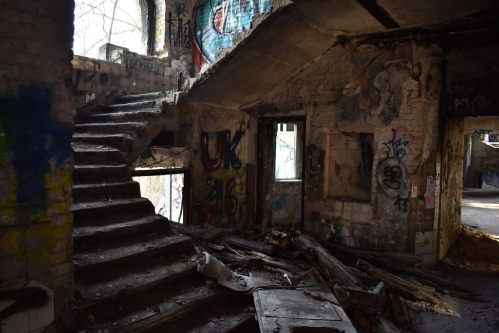 Crumbled stairs in abandoned children's hospital in Berlin