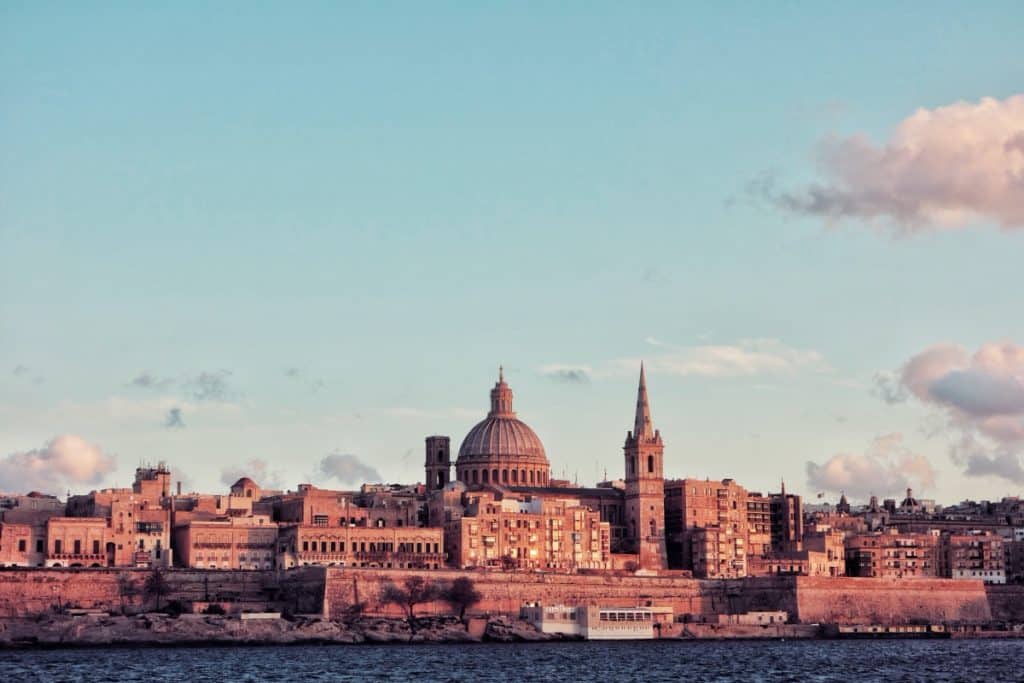 Watch the sunset over Valletta Harbour as a solo traveller